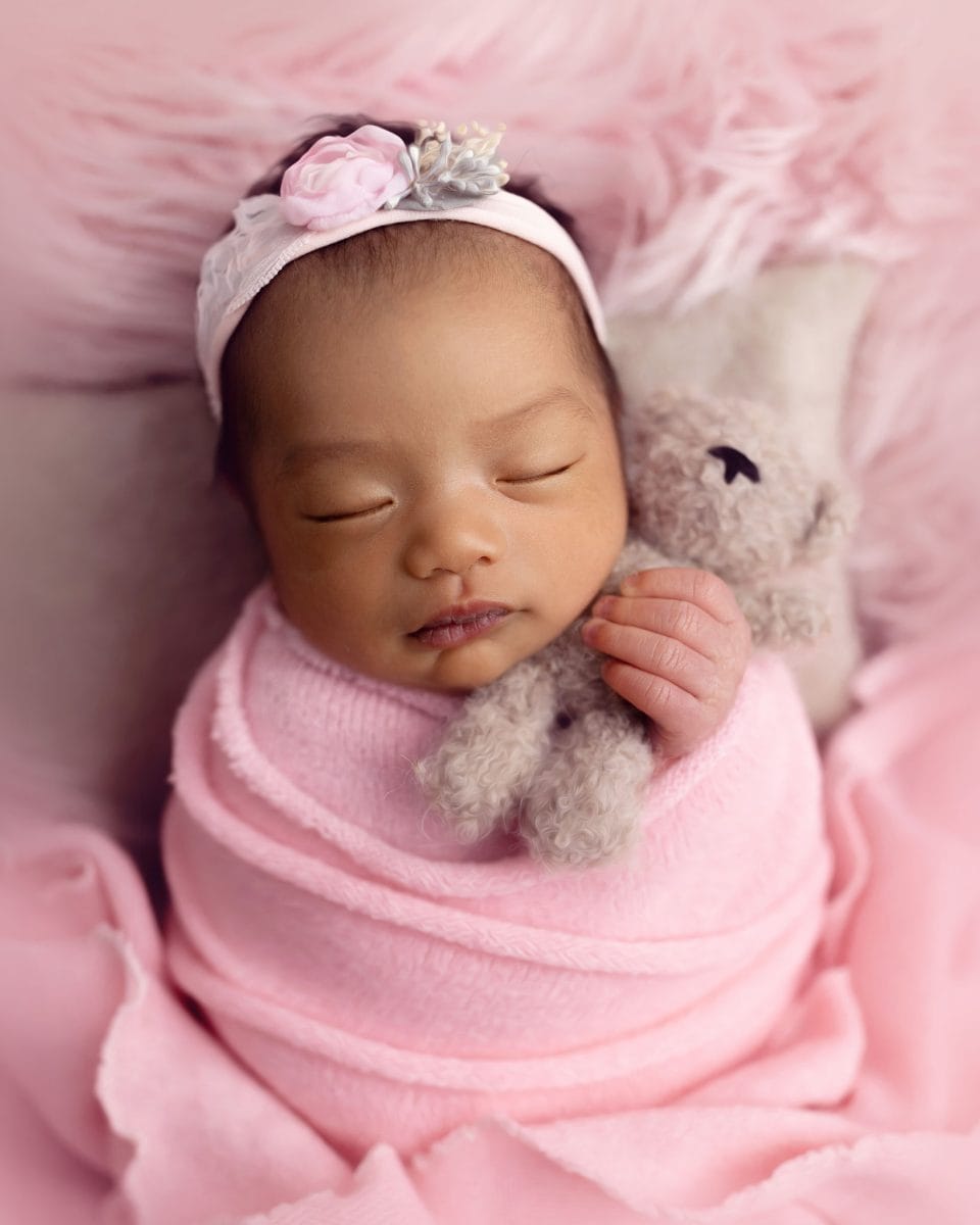 Baby-led newborn photography in a calm studio near Dorking RH5.