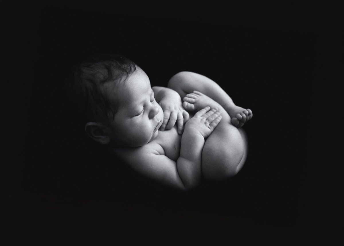Fine art newborn photography for new parents in Godstone and surrounding areas.