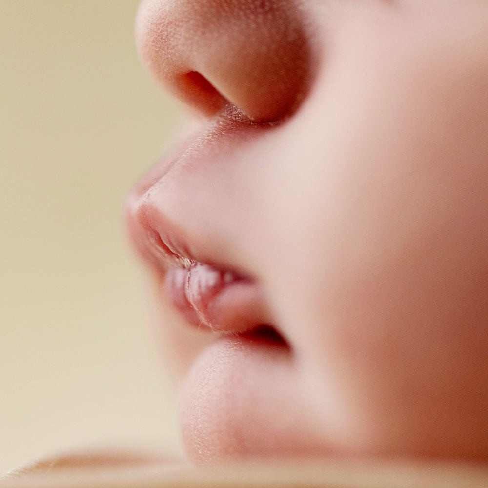 Natural newborn photography - delicate details such as mouth, lips and hands... all captured by Baby Shoots Photography
