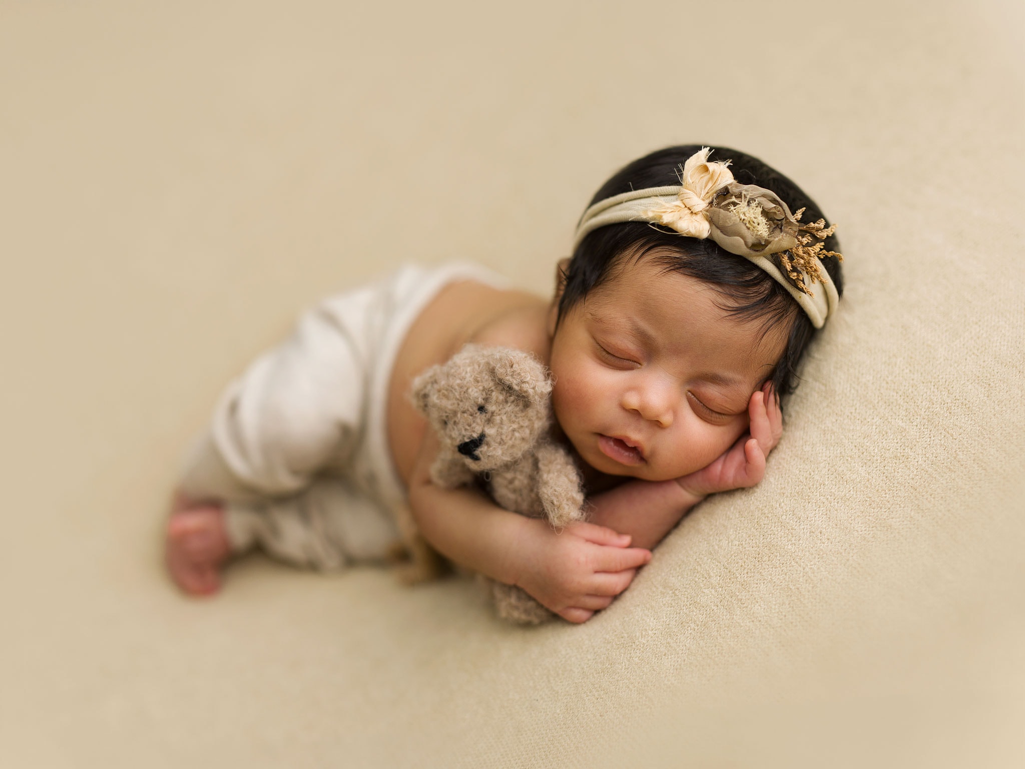 Baby-led newborn photography session allowing time for feeding and settling
